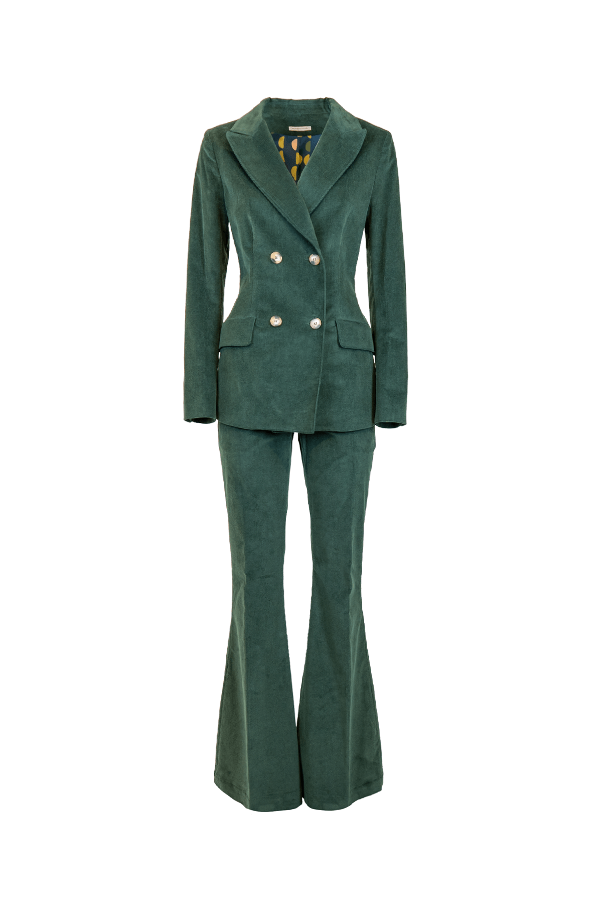 Elegante giacca doppio petto in velluto millerighe verde con pantaloni coordinati.